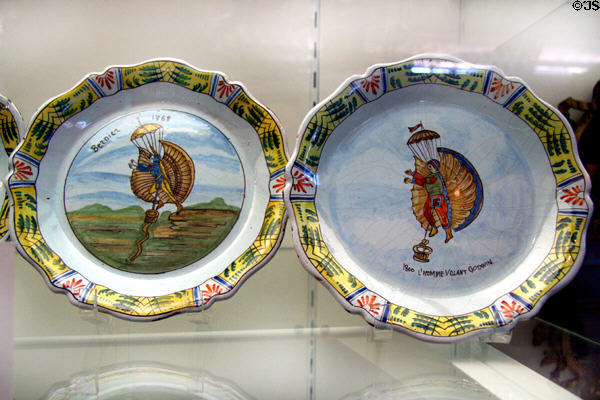 French ceramic plates (19thC) depicting early flights of Bernier (1768) & flying man Godwin (1800) at National Air & Space Museum. Chantilly, VA.