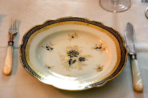 Dining table place setting with plate of George & Martha Washington at Oatlands. Leesburg, VA.