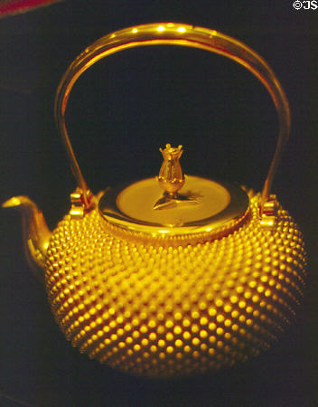 Gold Japanese tea pot given to MacArthur in 1963 in the MacArthur Memorial. Norfolk, VA.