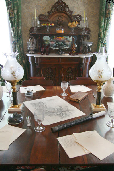 Dining room table in White House of the Confederacy with maps & strategic war documents. Richmond, VA.