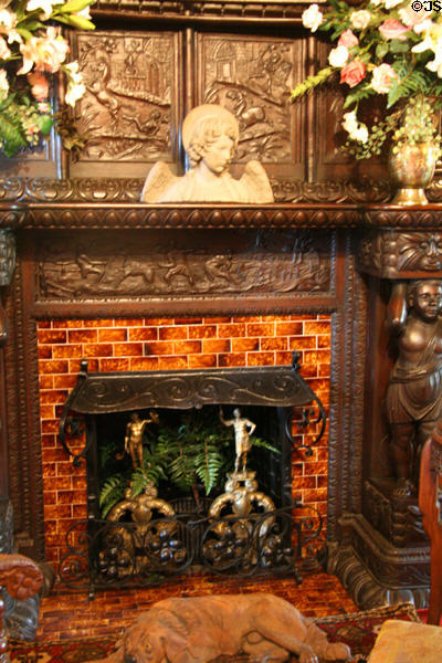 Hall fireplace with carved panels in Maymont Mansion. Richmond, VA.
