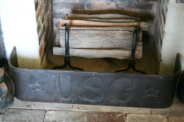 Fireplace fender with USG initials in U.S. Grant's HQ cabin at Hopewell. Hopewell, VA.