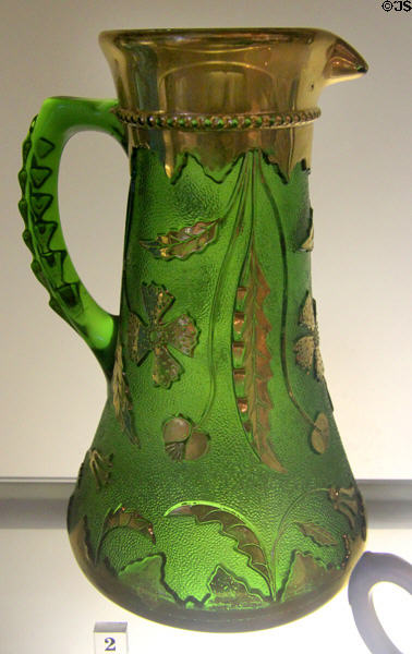 Green glass with applied gold Delaware-pattern pitcher (1890-1910) from Pittsburgh, PA at Bennington Museum. Bennington, VT.
