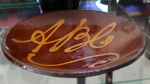 Redware plate with ABC at Bennington Museum. Bennington, VT.