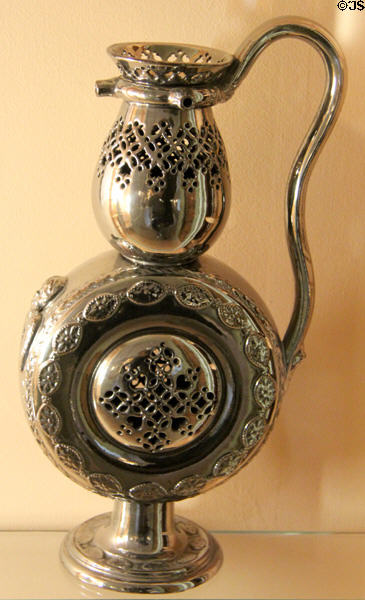 Metallic silver luster ceramic puzzle jug (c1820) at Shelburne Museum. Shelburne, VT.