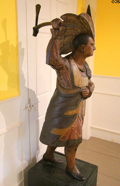 Cigar store Indian with Tomahawk (c1850-75) attrib. to John Cromwell at Shelburne Museum. Shelburne, VT.