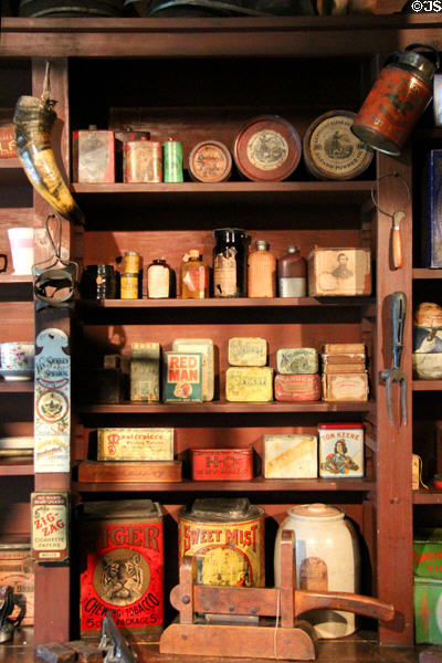 Antique tobacco & gunpowder boxes in General Store at Shelburne Museum. Shelburne, VT.