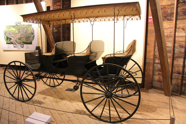 Three-seat surrey (c1900) from America in Round Barn at Shelburne Museum. Shelburne, VT.