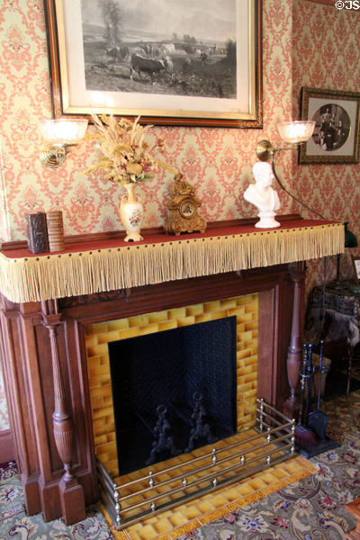 Sitting room fireplace in farm house at Billings Farm & Museum. Woodstock, VT.