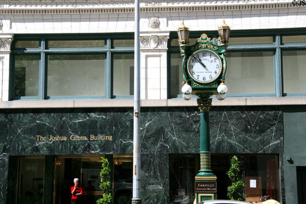 Decorative clock in front of Joshua Green Building. Seattle, WA.