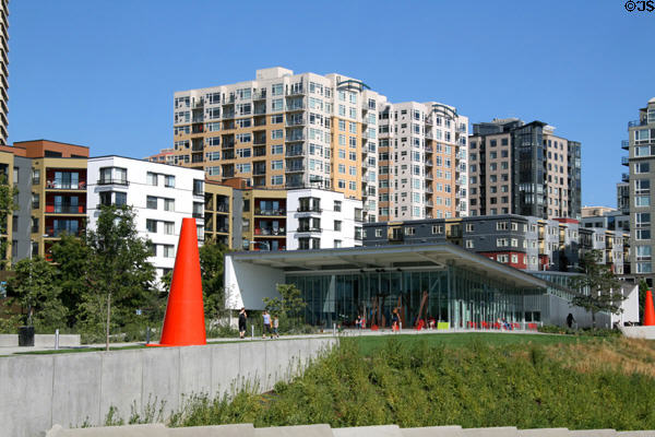 Olympic Sculpture Park with Paccar Pavilion & residential buildings beyond. Seattle, WA.