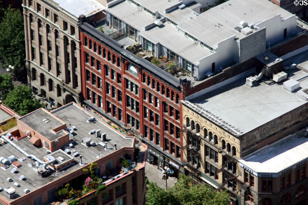 Historic west side of 100 block of 1st Ave. S. with Maynard Building (1892); Northern Hotel (1889) by Charles W. Saunders; Schwabacher plus Yesler Buildings (1890) both by Elmer Fisher. Seattle, WA.
