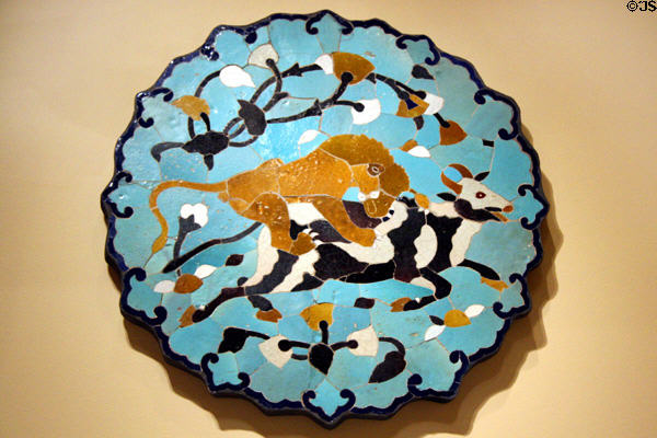 Persian ceramic mosaic of lion attacking a cow (15th-16thC) at Seattle Art Museum. Seattle, WA.