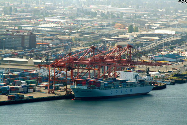 Cosco ship loading in Seattle Container Port. Seattle, WA.