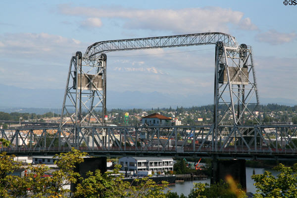 Murray Morgan (11th St.) Lift Bridge (1913) across Thea Foss Waterway frames Mt. Rainier. Tacoma, WA.