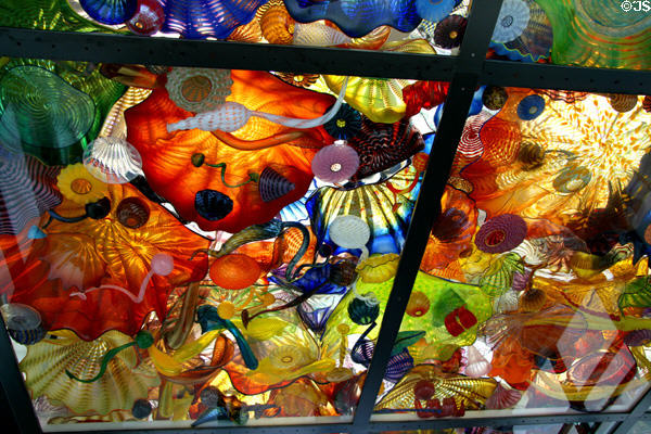 Glass sculptures (2002) by Dale Chihuly in ceiling of Seaform Pavilion bridge to Museum of Glass. Tacoma, WA.