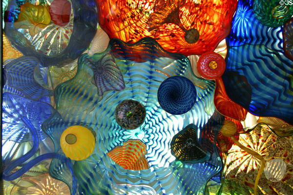 Blown glass forms by Dale Chihuly in ceiling of Seaform Pavilion bridge. Tacoma, WA.