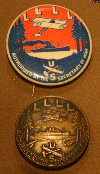 Government run Loyal Legion of Loggers & Lumbermen (LLLL) union buttons (WW II) at Washington State History Museum. Tacoma, WA.