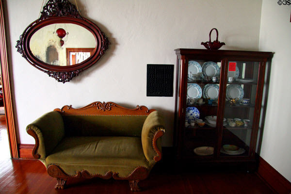 Settee & china cabinet in Hovander Homestead house. Ferndale, WA.