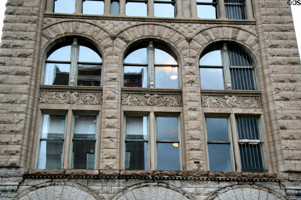 Facade details of Romanesque Batavian Building. La Crosse, WI.