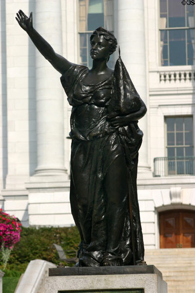 Forward statue by Jean Miner is Wisconsin Women's Memorial (1893) display at Columbian Exposition now on State Capitol grounds. Madison, WI.