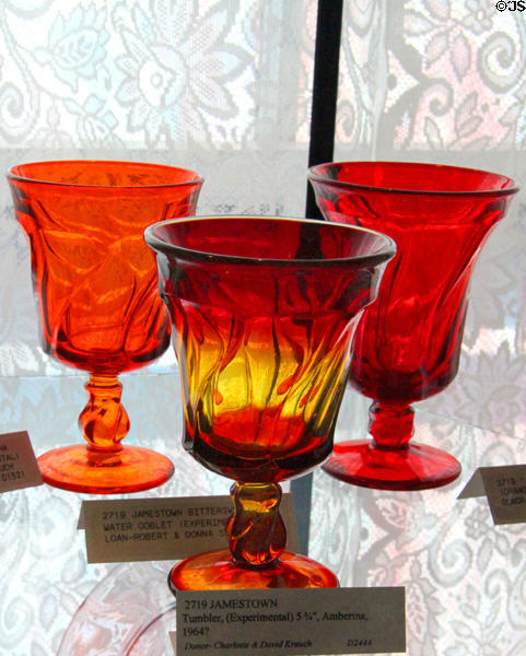 Jamestown water goblets in red & amberina (c1964) at Fostoria Glass Museum. Moundsville, WV.