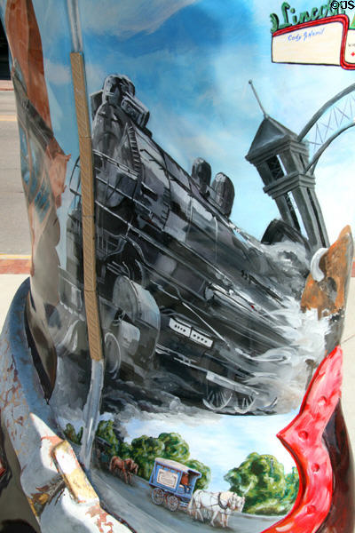 Locomotive painted on Downtown Cheyenne cowboy art boot. Cheyenne, WY.