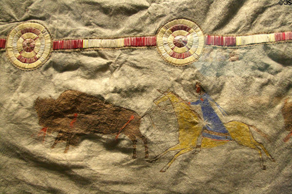 Detail of native hunting buffalo of Northern Plains Indian painted buffalo robe (c1875) at Buffalo Bill Center of the West. Cody, WY.