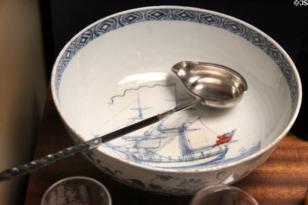 Tin-glazed earthenware punchbowl with Brocklebanks ship (1770) from Liverpool plus silver & whalebone punch ladle (1796) from London at Walker Art Gallery. Liverpool, England.