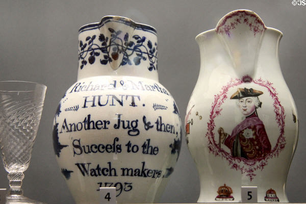 Earthenware 'success to watch makers' jug (1793) & porcelain jug painted with Frederick of Prussia, Britain's ally in Seven Years' War with France (c1760) by Richard Chaffers' factory, both from Liverpool at Walker Art Gallery. Liverpool, England.
