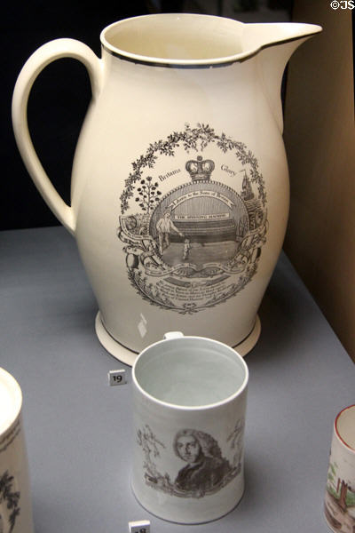 Creamware jug with transfer-print of cotton spinning machine (c1800) by T. Baddeley of Hanley & porcelain mug with transfer-print of PM William Pitt (c1760) by Richard Chaffers' factory, Liverpool at Walker Art Gallery. Liverpool, England.