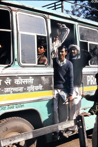 Bus passengers on road to Mandawa. Mandawa, India.