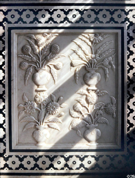 Marble relief carving of plants in Jaipur's Amber Palace. India.