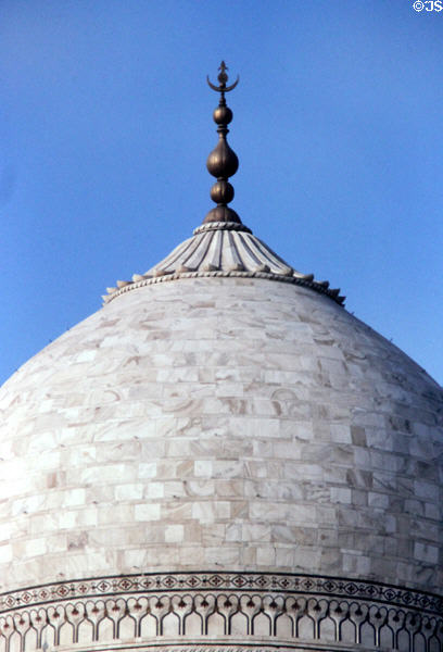 Detail of metal work on top of dome on Taj Mahal, Agra. India.