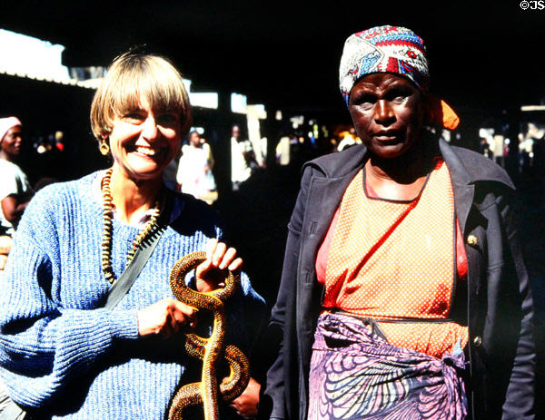 Buyer & vendor in public market in Harare. Zimbabwe.