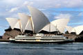 Sydney Ferry boat before Sydney Opera House. Sydney, Australia.