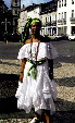 Woman in regional dress of Salvador in town square. Brazil.