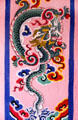 Dragon mural painted on a building in Paro. Bhutan.
