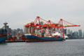 Container ship at Vancouver container port. Vancouver, BC.
