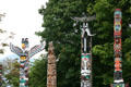 Carved Northwest coast native totem poles in Stanley Park. Vancouver, BC.