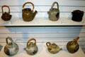 Stoneware & earthenware artistic teapots made by provincial artists during the 1970s at New Brunswick Museum. Saint John, NB.