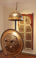 Forged steel overlaid with gold Rondache & helmet from Iran at Aga Khan Museum. Toronto, ON.