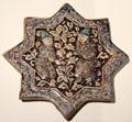 Fritware tile painted blue & brown with two men from Iran at Aga Khan Museum. Toronto, ON.