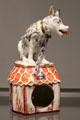 Porcelain figure of dog & kennel by Du Paquier of Vienna, Austria at Gardiner Museum. Toronto, ON.