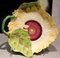 Fritware sunflower dish by Chelsea of London at Gardiner Museum. Toronto, ON.