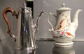 Coffee pots in silver by Gabriel Sleath of London & steatitic by Worcester of England at Gardiner Museum. Toronto, ON.