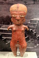 Earthenware standing female figure from Tlapacoya or La Bocas, Mexico at Gardiner Museum. Toronto, ON.