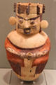 Chancay culture earthenware male figure holding cup from Central Coast Peru at Gardiner Museum. Toronto, ON.