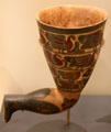 Etruscan-Corinthian earthenware vase in shape of human leg painted with friezes of birds at Royal Ontario Museum. Toronto, ON.