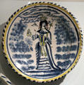 Tin-glazed earthenware charger showing Queen Anne probably from Bristol, England at Royal Ontario Museum. Toronto, ON.